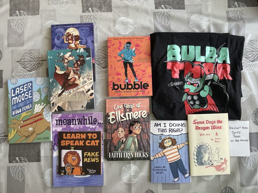 A bunch of books including Laser Moose, Delilah Dirk, Bubble, One Year At Ellsmere, Am I Doing This Right?, and Some Days The Dragon Wins.