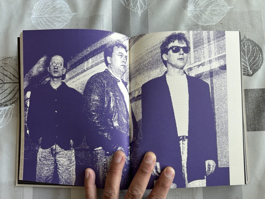 A page spread showing the Bitmap Brothers trio in their iconic monochrome pixelated style