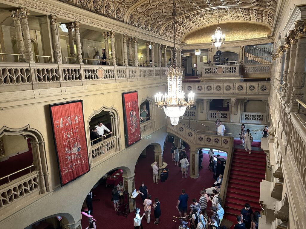 A view of the main, multi-level lobby of the Orpheum theatre in Vancouver, BC