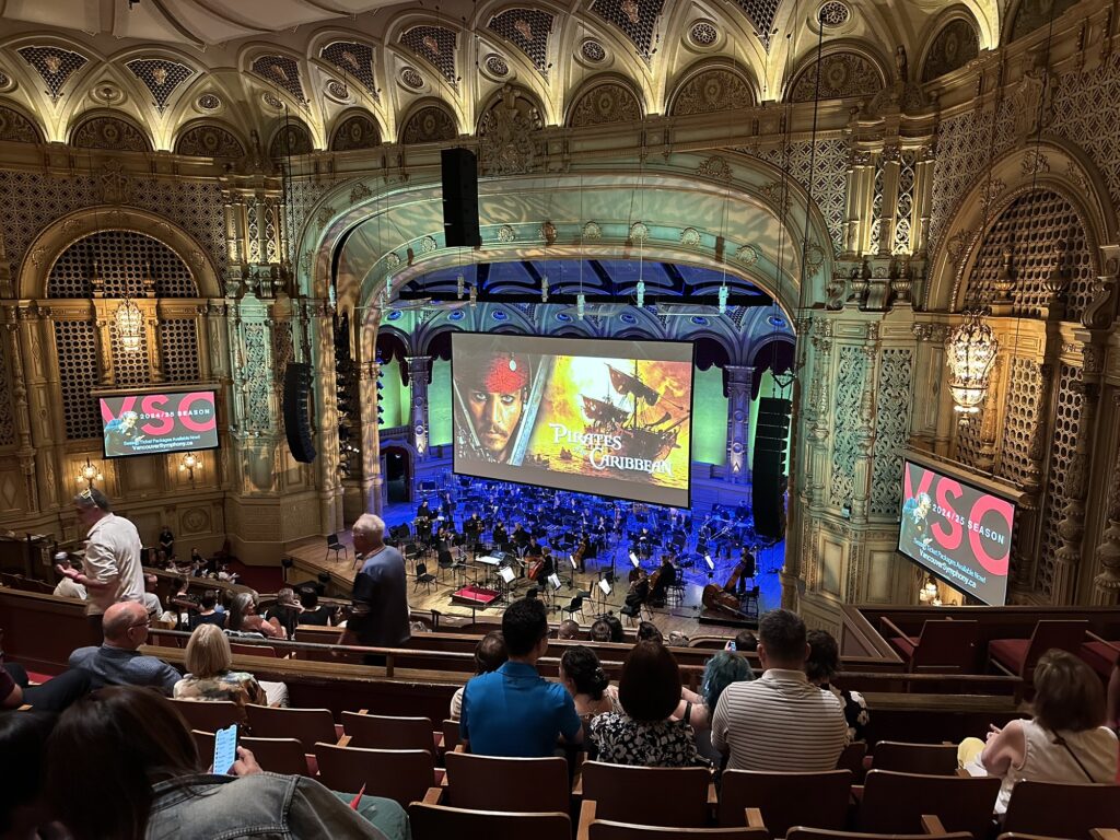 View from the balcony at the Orpheum theatre in Vancouver, BC. The orchestra is taking place shortly before the movie starts.