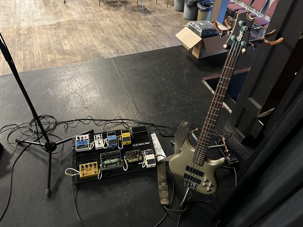 My bass guitar and pedal board on stage… as always the bass player is ready to go while everybody else is still setting up! 