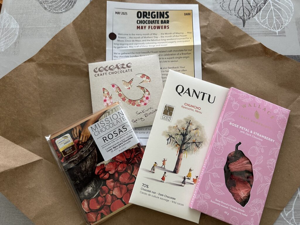 Four bars of chocolate:

Mission Chocolate "Rosas", 61%
Cocoaro "Sakura Spring Blossoms"
Quantu "Chuncho" 70%
Wallace "Rose Petal & Strawberry" 76%
