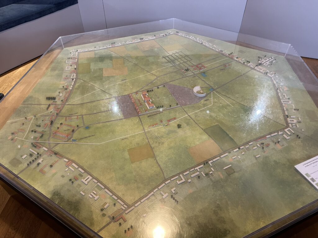 A map of the ancient Gallo-Roman town of Gisacum, a planned sanctuary with a multi-use religious/public use/entertainment complex in the centre.