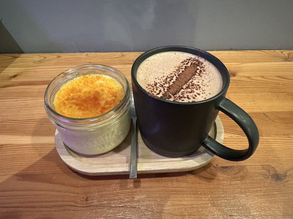 A creme brulee and a hot chocolate