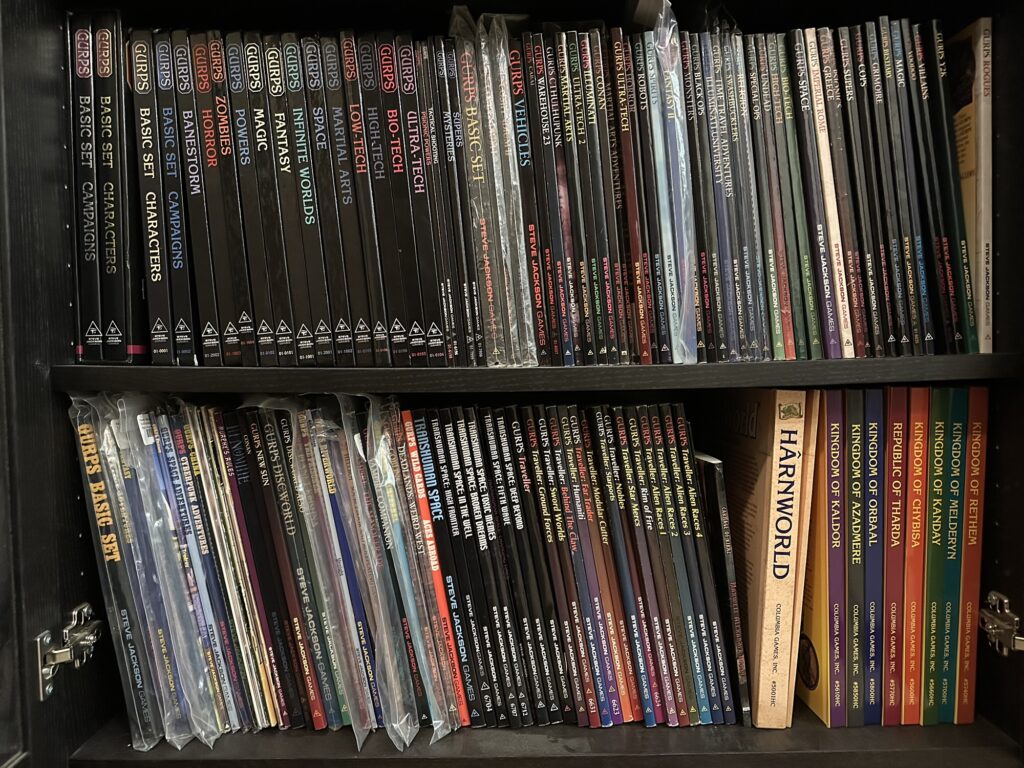 A photo of my GURPS shelves, with a bunch of GURPS Traveller books in the bottom middle.

If you're the type of person who loves spending 10 minutes zooming into other people's shelf pictures... have fun!