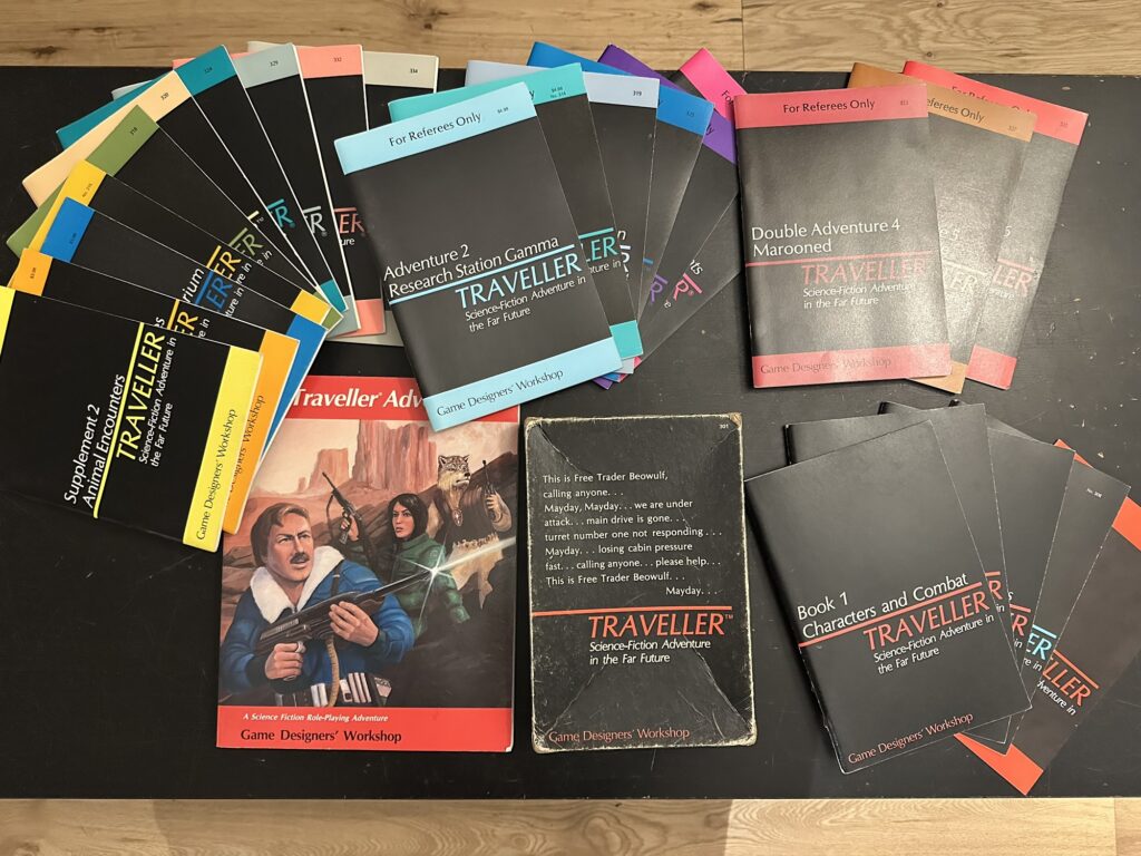 A big dump of Classic Traveller books, including the original boxed set, the Traveller Adventure book, and a bunch of Supplements, Adventures, and Double Adventure books