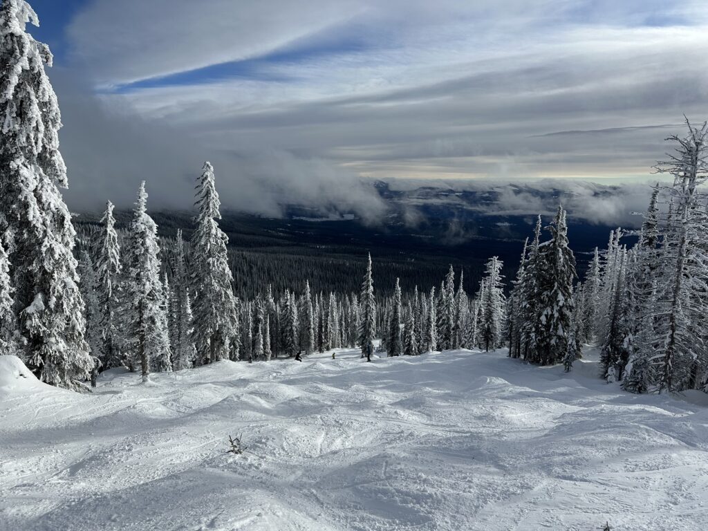 A rare bit of sunshine over a run in Big White, BC