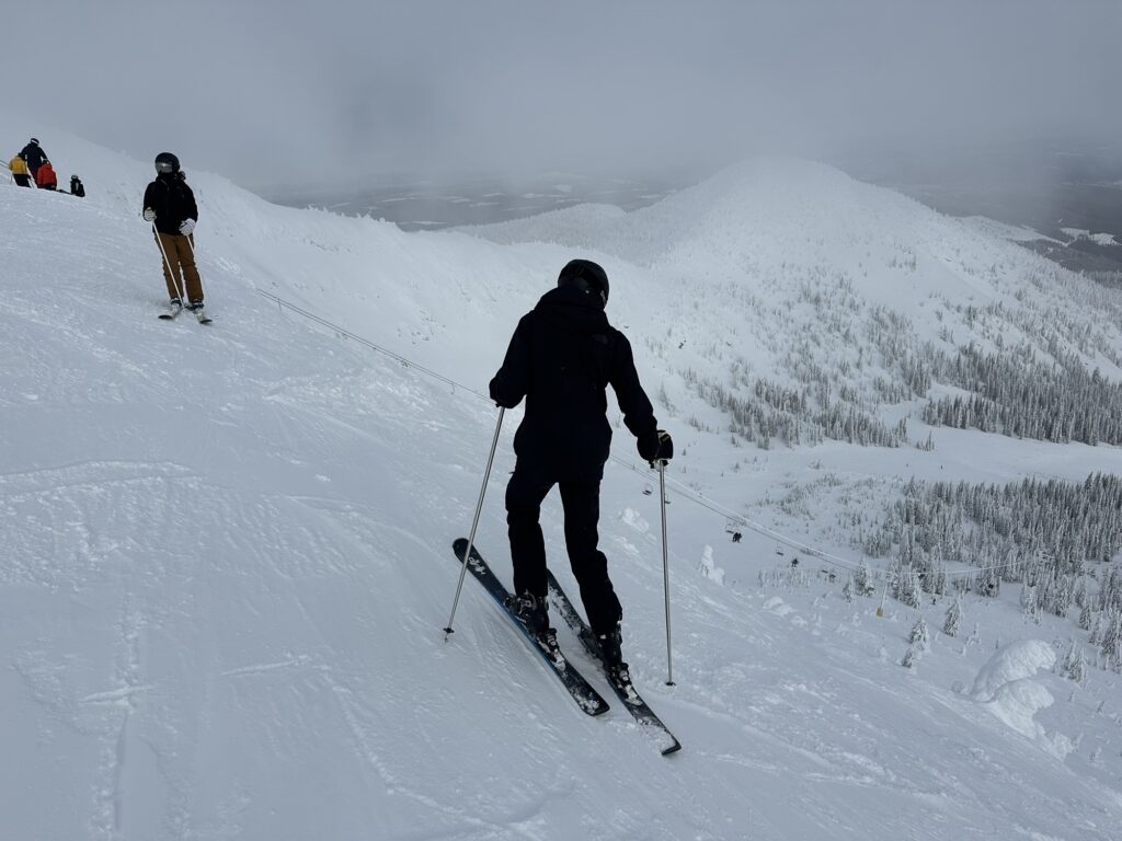 Top of the cliff chair lift at Big White, BC. You can vaguely tell how steep it is given the view over the valley!