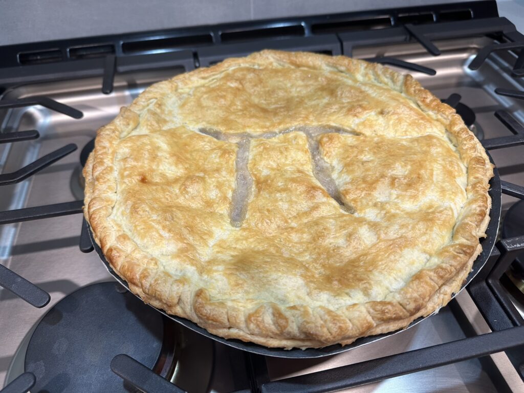 The picture of an apple pie, with the sign for "Pi" engraved in the top crust. Pi-Day (3/14 in the wrongly ordered American dating notation) was just a few days ago.