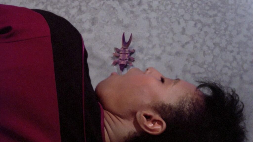 A weird alien bug escapes from its human host after she has been killed. Big "WTF" moment followed by some giggling from me