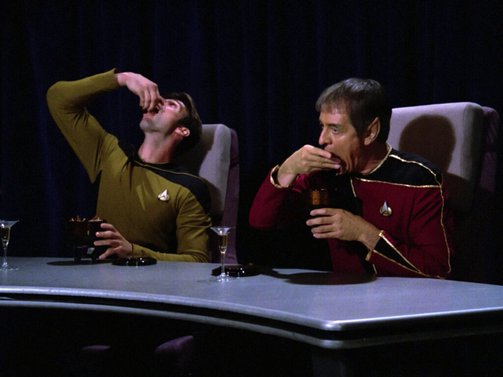 The obligatory "we love to eat something you find disgusting", to really show the mind-controlling aliens are weird and bad.