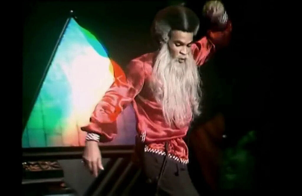 Bobby Farrell, of Boney M, dancing on stage while disguised as what can only be best described as "black disco Rasputin".

By the way, in case you didn't know, Farrell never contributed any vocals to Boney M's recordings, and never actually sang on stage. He was just a dancer.