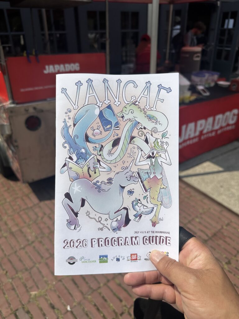 The VanCAF program guide, and the Japadog food truck in the background. IYKYK