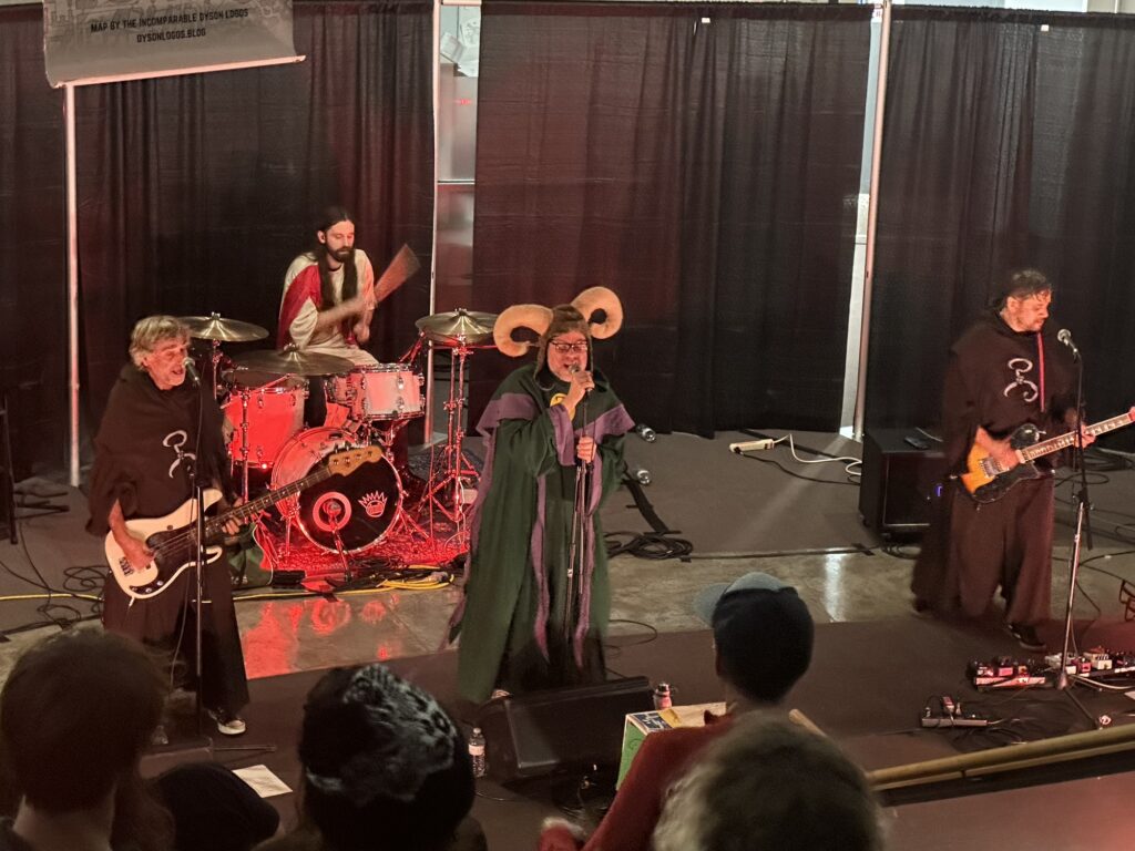 The Thickets playing in their usual "Lovecraftian cultist" outfit, except for the drummer dressed as Jesus.
