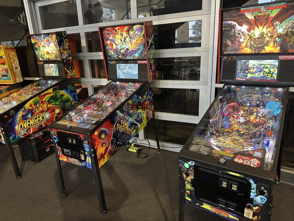 Pinball machines at KamCon: Avengers, Foo Fighters, and D&D. The D&D one off course has a dragon, but also a gelatinous cube, a kobold mine, and a bunch of fun things.