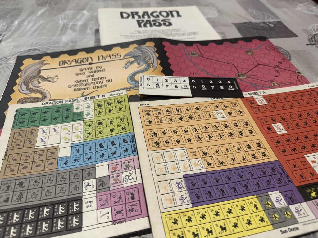 The unpunched chits of the Dragon Pass board game.