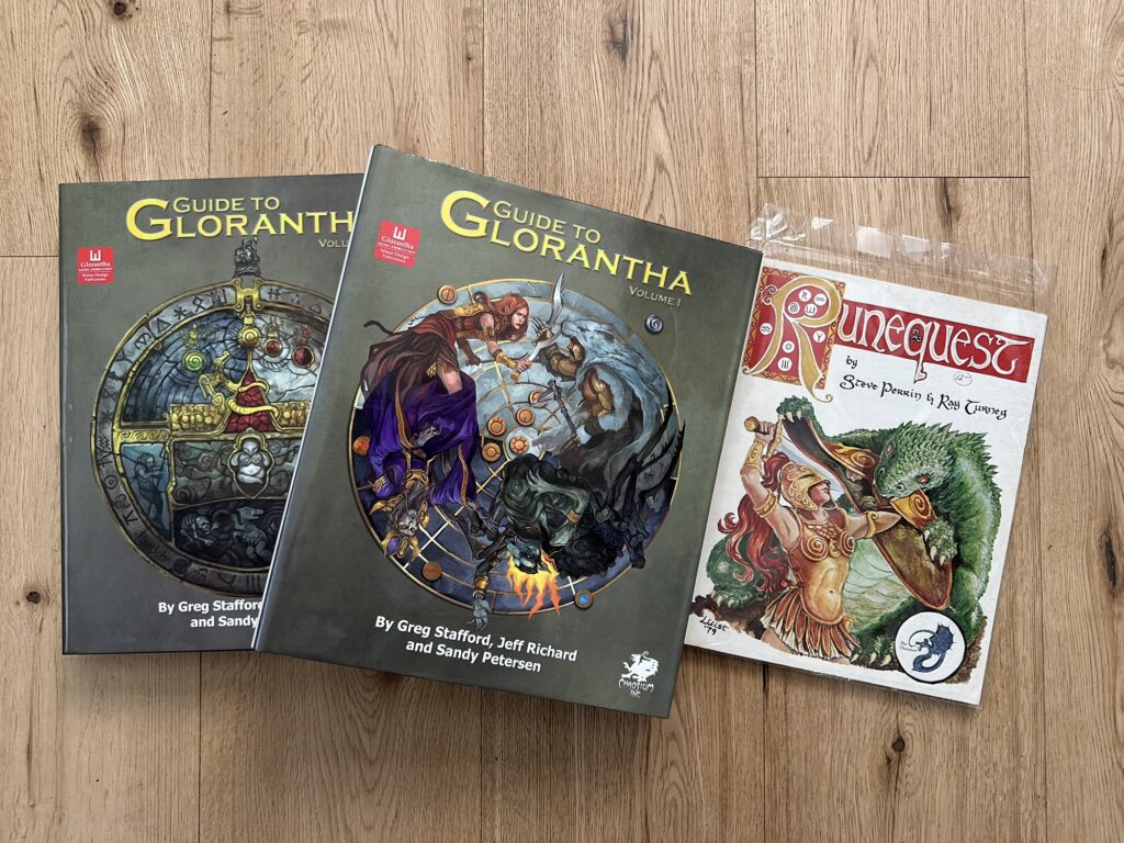 The two volumes of the Guide to Glorantha, and the RuneQuest 2e rulebook.